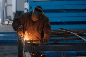 Structural welding services in Western Sydney showing steel beam welding on a construction site